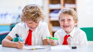 pupils giggling at fairstead house School in Newmarket, Suffolk during a commercial photoshoot