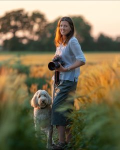 Cambridge photographer, Louisa French, pictured with her dog at sunset
