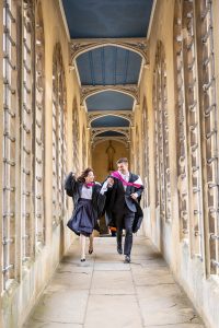 Cambridge students inside the Bridge of Sighs at St Johns College